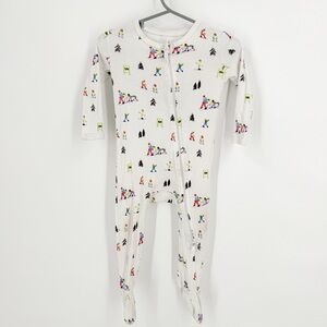 Cozy White Footie Pajamas with Skiing Motifs
